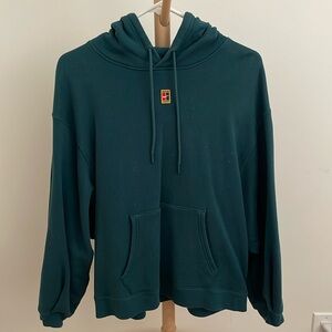 Forest green hoodie from Nike, size L